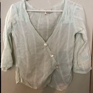 3/$40-Unique O’Neill top with criss cross front
